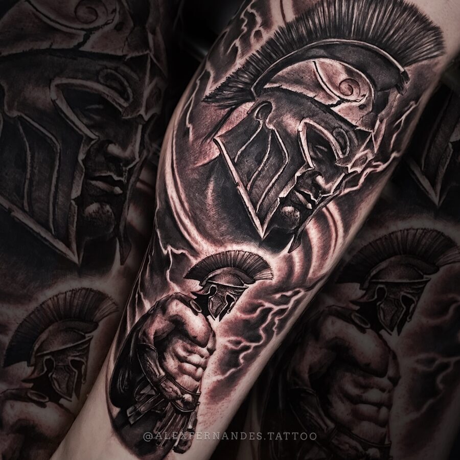 Black and grey Spartan warrior realism tattoo by Alex Fernandes